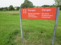 A warning that unexploded munitions still litter the area
